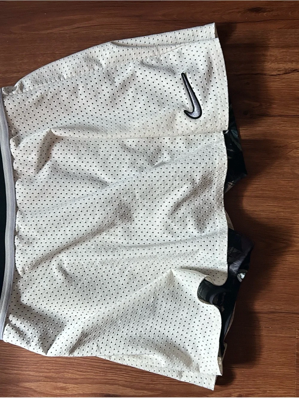 Nike White Perforated Athletic Shorts with Black Swoosh
